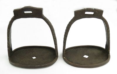 A PAIR OF CHINESE QING DYNASTY STIRRUPS. Handwrought of iron, well-patinated, with chiseled 