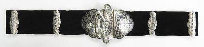 A CAUCASIAN NIELLOED SILVER BELT. The large buckle of characteristic two-piece form, with 