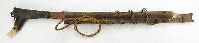A DAYAK HEADHUNTER PARANG IHLANG OR MANDAU SWORD. The grip of ironwood, finely-carved with aso 