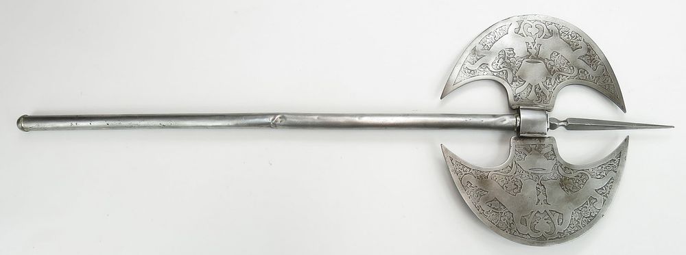 Lot 190: A RARE PERSIAN DOUBLE-HEADED AXE