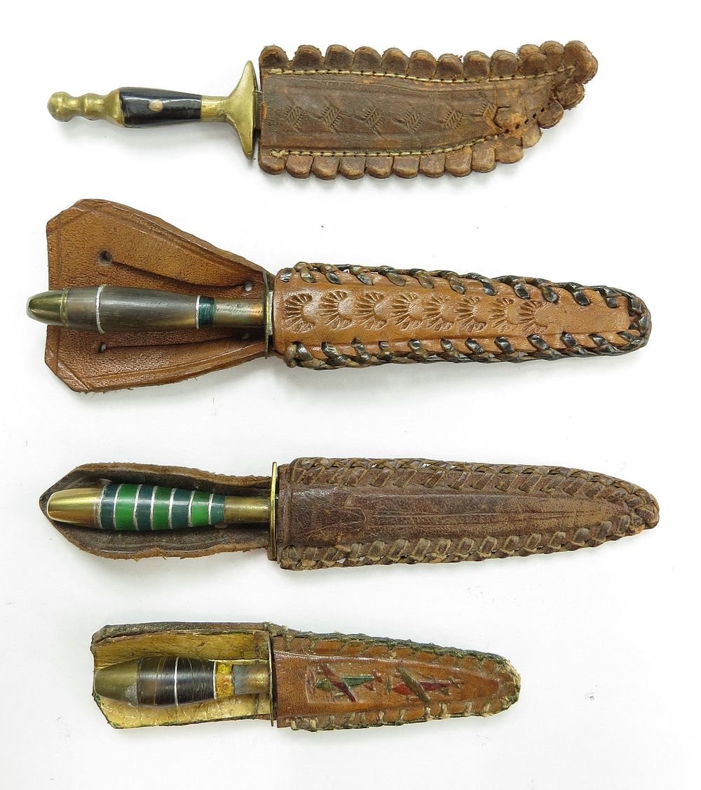 Lot 322: FOUR MINIATURE MEXICAN DAGGERS