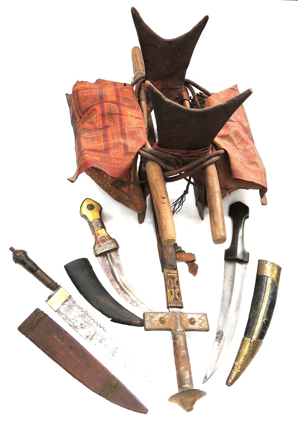 Lot 9: A RARE TUAREG CHILDS SADDLE, TAKOUBA SWORD AND DAGGERS