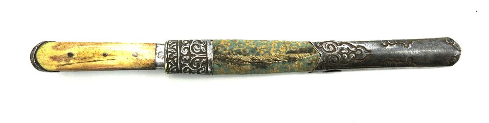 Lot 59: A TIBETAN DAGGER