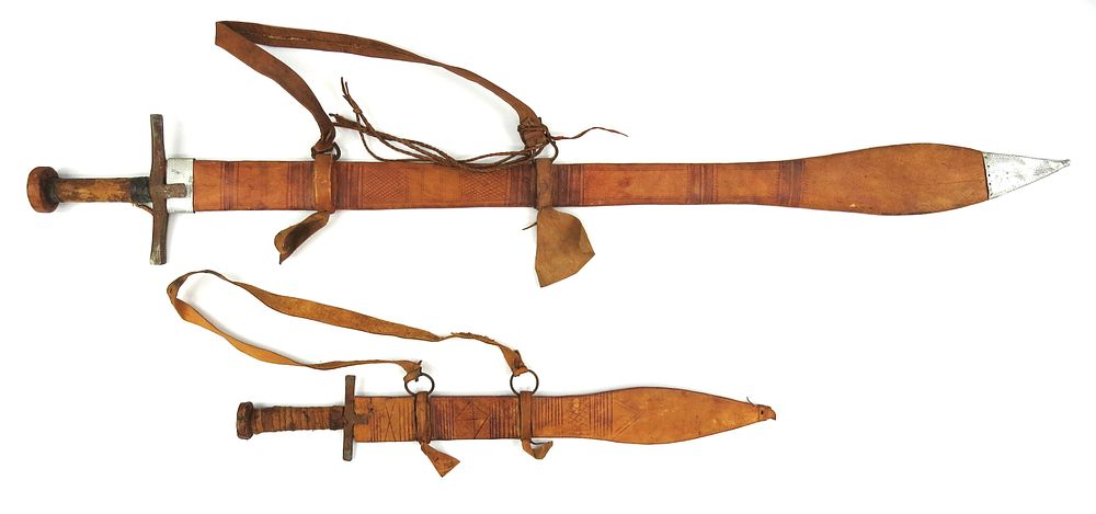 Lot 190: A RARE PAIR OF SUDANESE KASKARA SWORDS