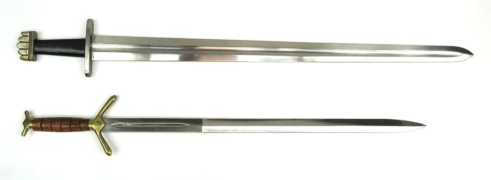Lot 341: TWO REPLICA BROADSWORDS