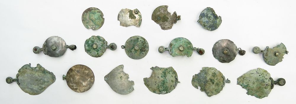 Lot 344: A RARE SET OF 16 KHAZAR HORSE TRAPPING ELEMENTS