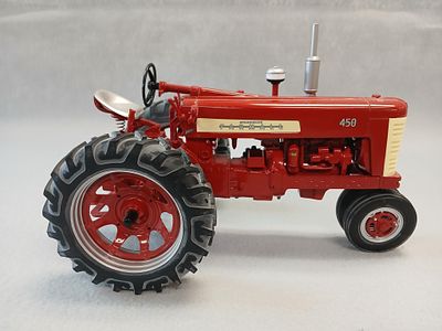 McCormick Farmall 450 Die Cast Toy Tractor. 1/16 scale SpecCast 30th Anniversary