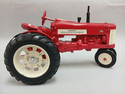 McCormick Farmall 350 Diecast Toy Tractor. 1/16th scale