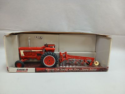 706 Ertl Case Farmall Die Cast Toy Tractor. Includes Farmall 706 Tractor with plow- Dealer 