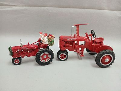 McCormick Farmall Toy Tractors. Includes 2 Tractors -plastic Farmall Model B with sickle Mower 