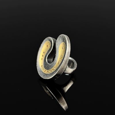 Designer ring, Spinoly, sterling silver and fine gold (tested), total weight 34.7 g 