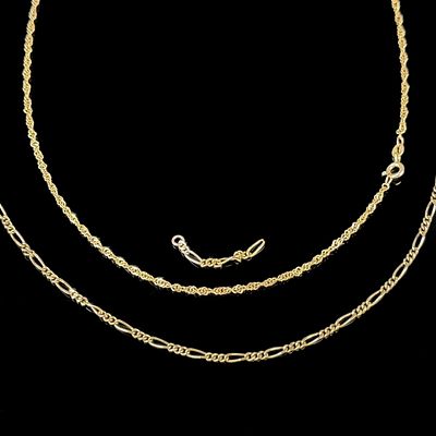 Two chains, each 333/8k yellow gold (each hallmarked), total weight 8.42g, both damaged