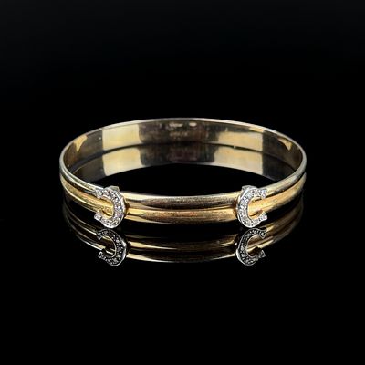 Cartier Armreif, 750/18K Gelb- und Wei&szlig;gold (punziert), Gesamtgewicht 18,7g, nummeriert 416519, ges