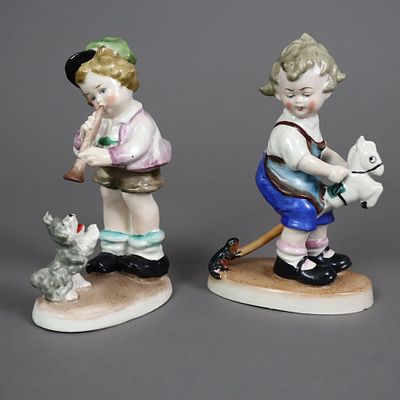 A Pair of Children Figures - Leube & Co., Reichmannsdorf, mid-20th century, porcelain 