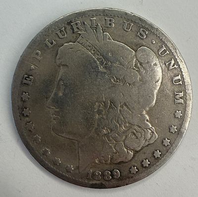 שנה 1889- מטבע אמריקאי אספני מסוג One Dollar בעיצוב העיט האמריקאי, בסגנון Morgan Dollar הקלאסי. 