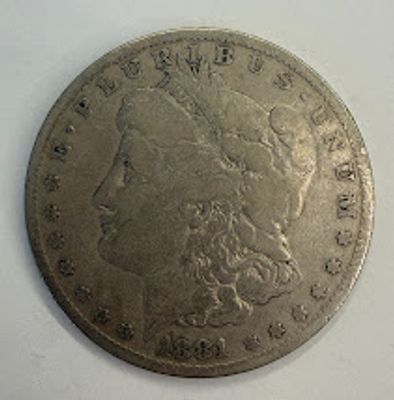 שנה 1881- מטבע אמריקאי אספני מסוג One Dollar בעיצוב העיט האמריקאי, בסגנון Morgan Dollar הקלאסי. 