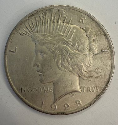“מטבע כסף אמריקאי מקורי מסוג Peace Dollar משנת 1923, עשוי 90% כסף. מטבע היסטורי שהונפק לאחר 