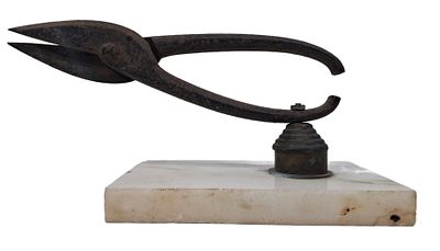 Dan Ben Amotz - דן בן אמוץ. Scissors for tin on a marble slab, handmade by Dan Ben Amotz.