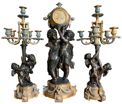 Каминный гарнитур: часы и парные канделябры "Путти". A. Carrier. Франция. Конец XIX века. . Бронз 