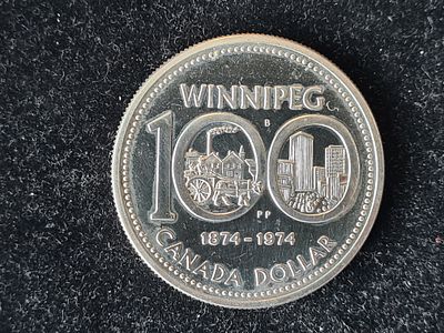 Монета Канада - 1 доллар (dollar) 1974 года "100 лет Виннипегу". Серебро. Вес 23,3276 гр. 