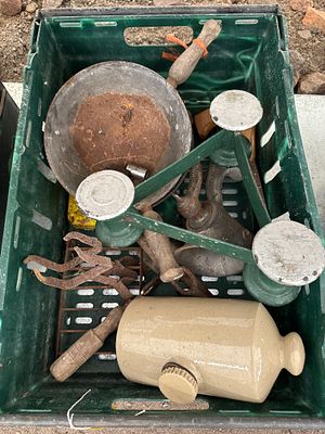 A box of vintage household items
