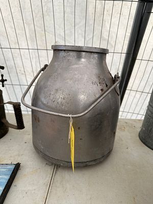 A vintage milk can