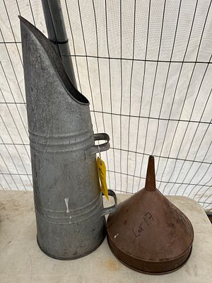 A coal scuttle &amp; a copper funnel