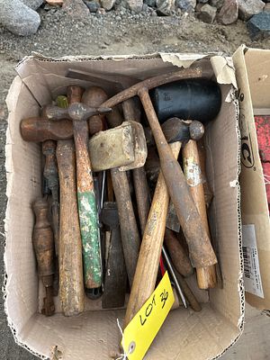 A box of hammers, screwdrivers