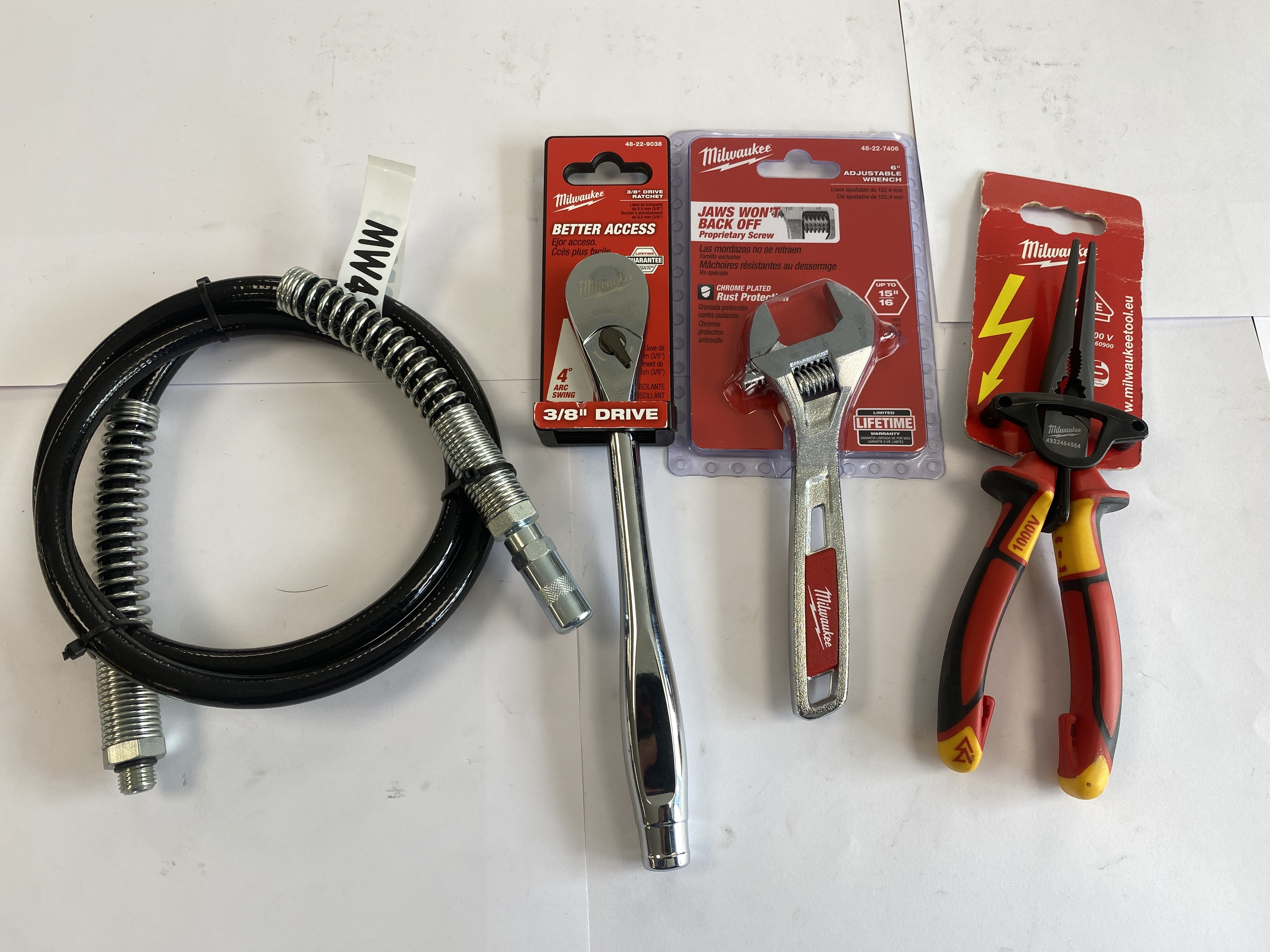 * An Assortment of Milwaukee Hand Tools and Mechanical Accessory