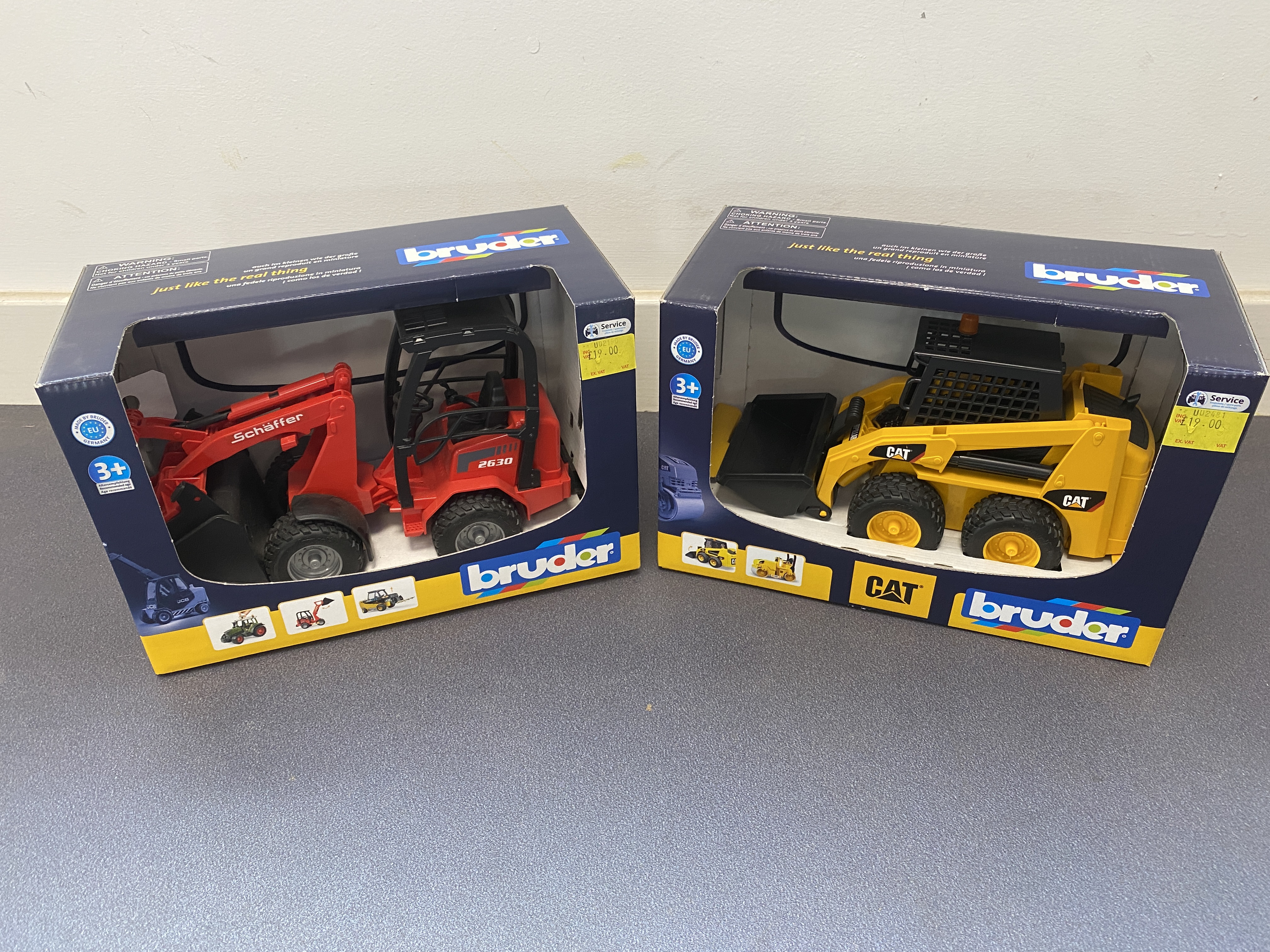 * Two Bruder 1:16 Scale Construction Vehicles Comprising a Caterpillar Skid Steer Loader and a Schäffer Articulated Road Loader