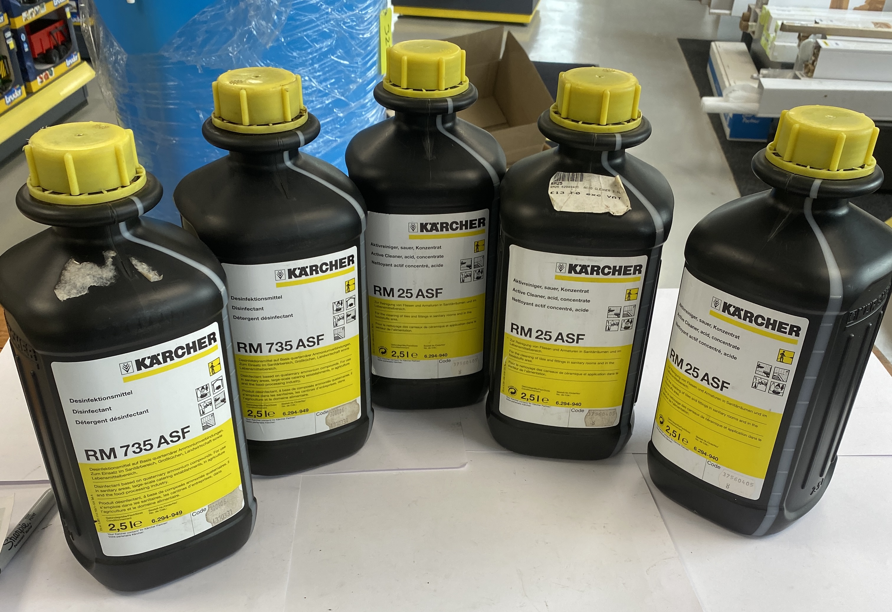 * A Collection of Five Karcher RM 735 ASF and RM 25 ASF Cleaning Concentrates