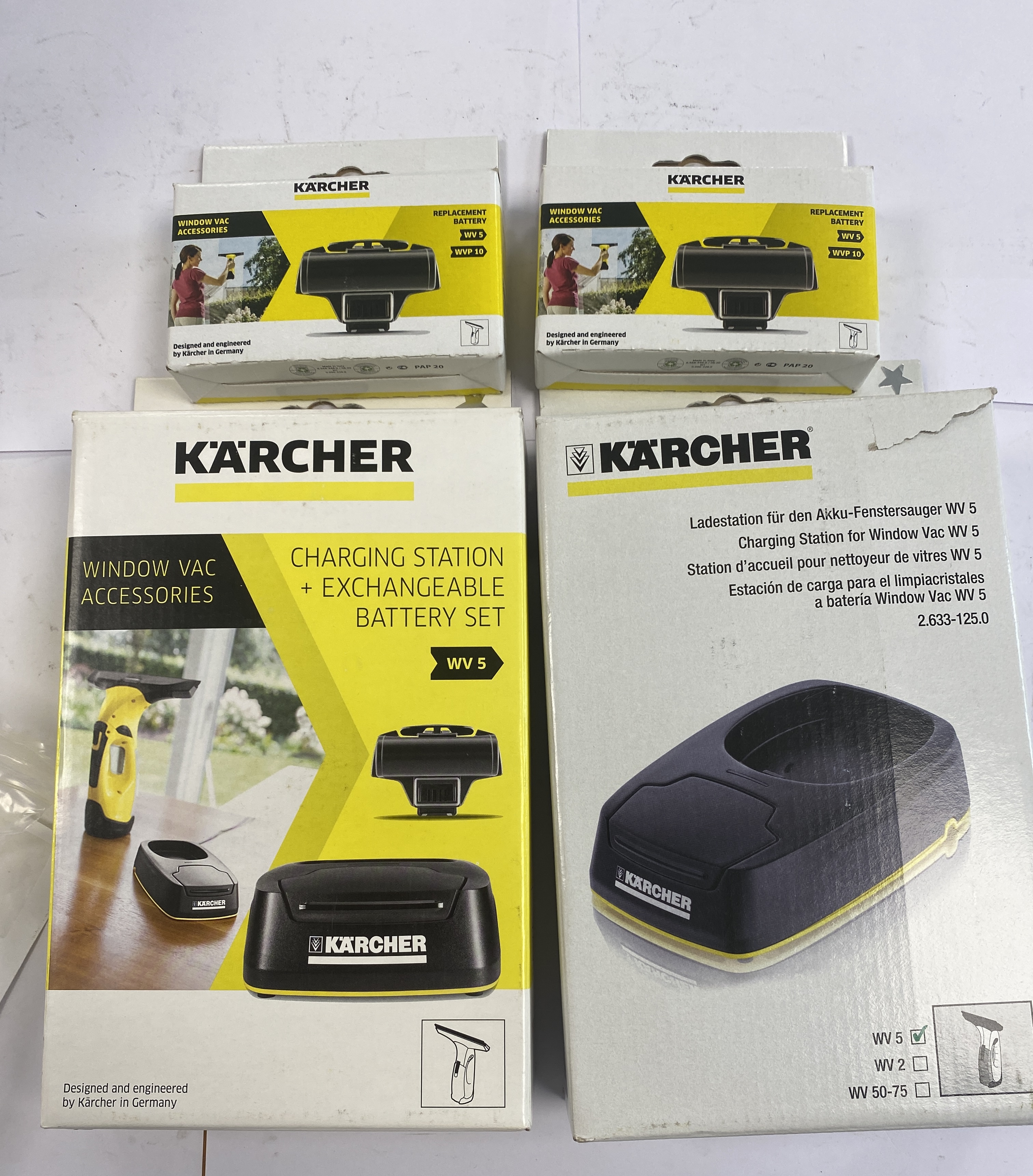 * A Set of Karcher Window Vacuum Accessories Including Charging Stations and Replacement Batteries for WV 5 and WVP 10
