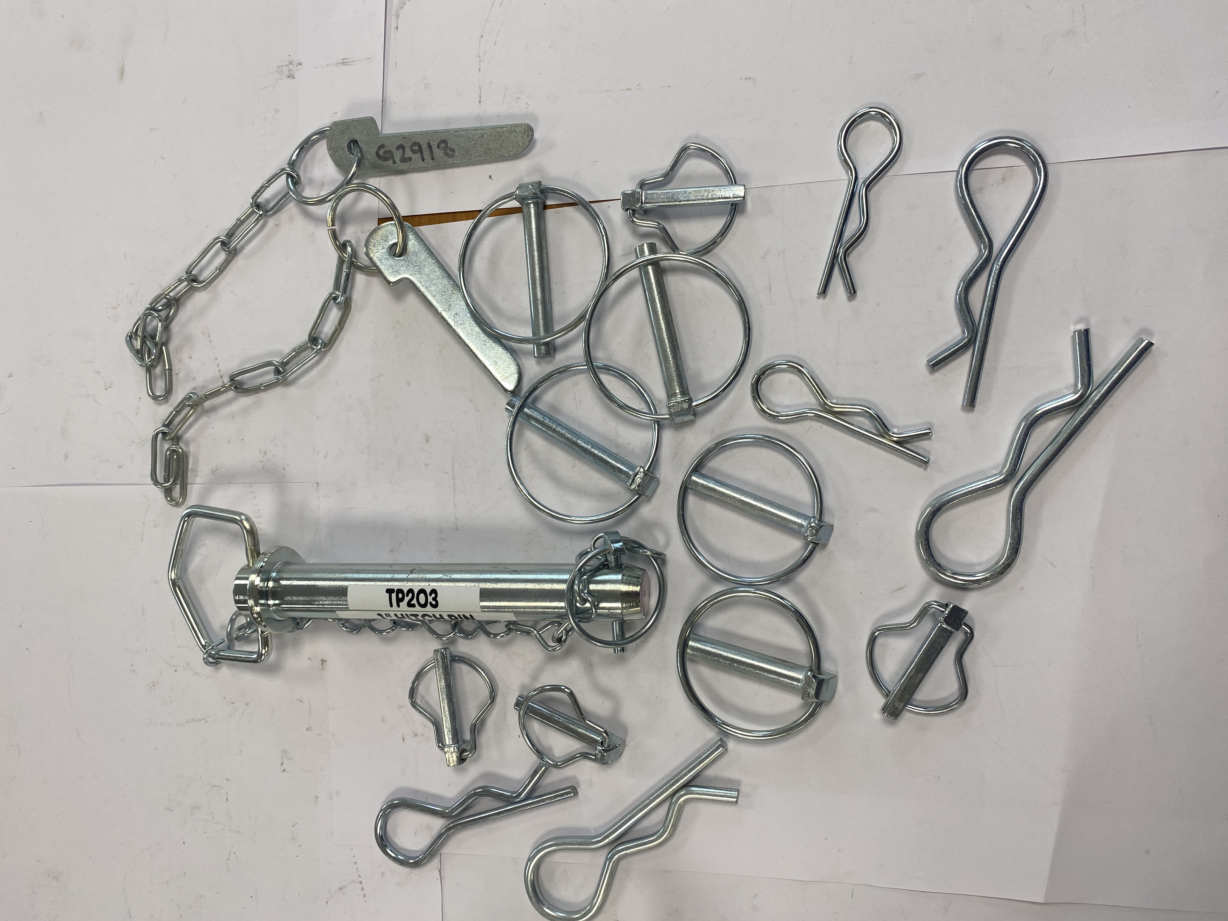 * An Assortment of Zinc-Plated Steel Hitch Pins and R-Clips