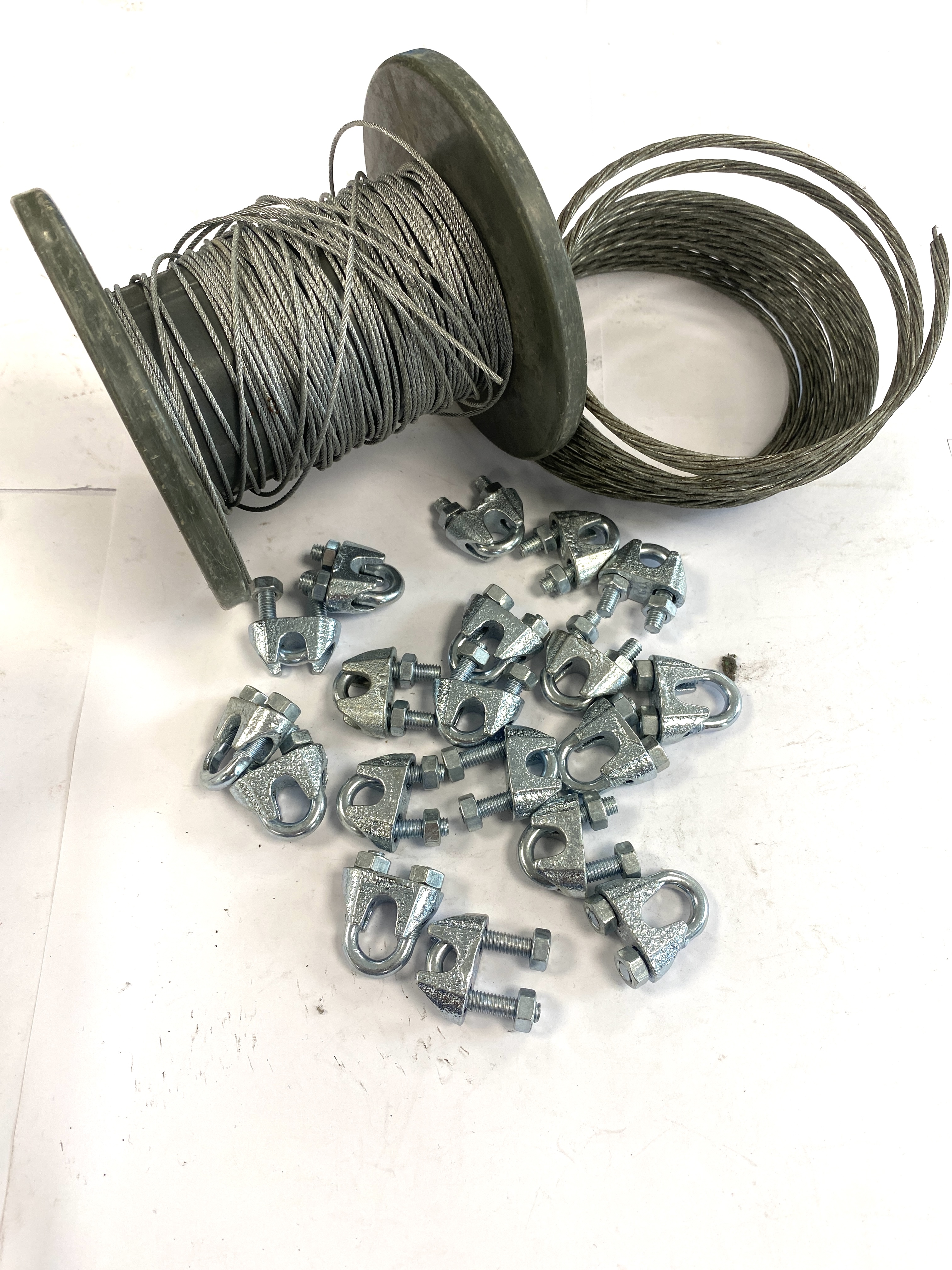 * An Assortment of Galvanized Steel Aircraft Cable and Wire Rope Clamps