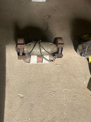 *. Bench grinder working