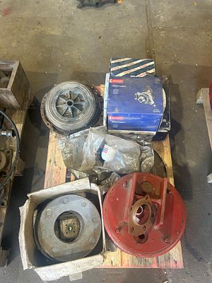 *. Pallet of brake pads, and clutch plates and air bag.