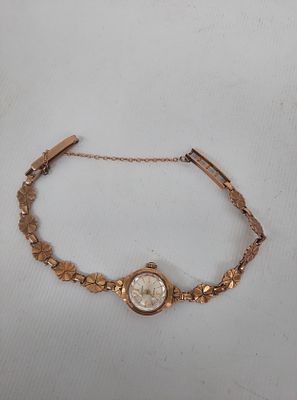 Ladies Accurist 9ct gold cased and 9ct gold fancy strap watch, 11.1 grams gross