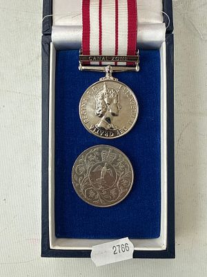 Reproduction medal and old crown