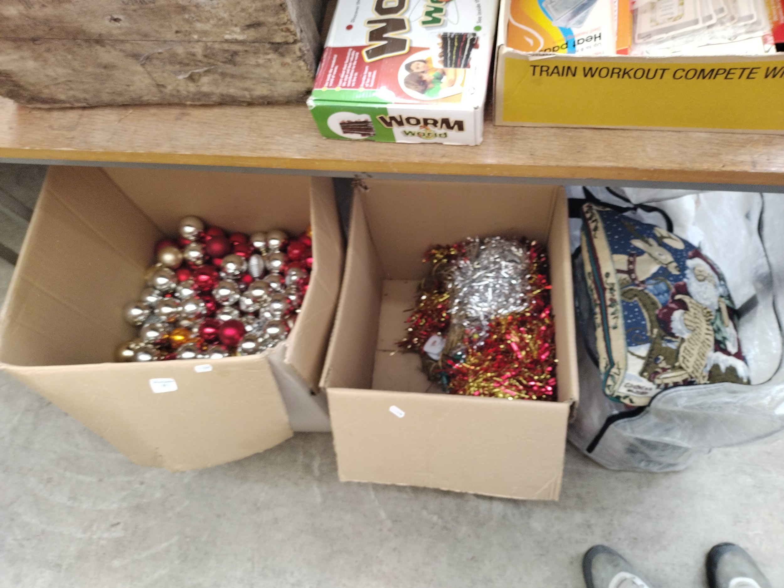 Two boxes and bag of Christmas decorations