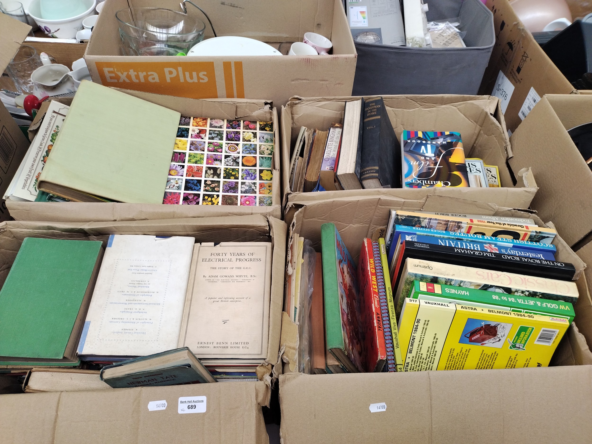 Four boxes of assorted books