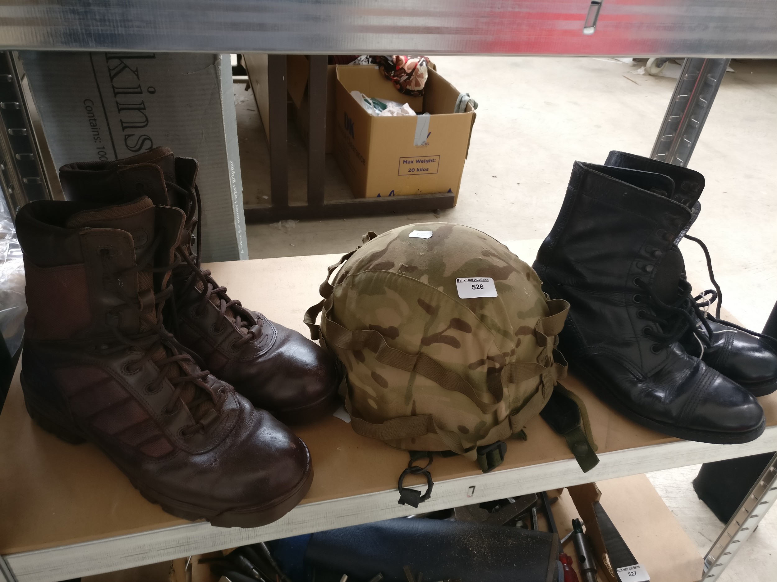 Two pairs of boots and military helmet