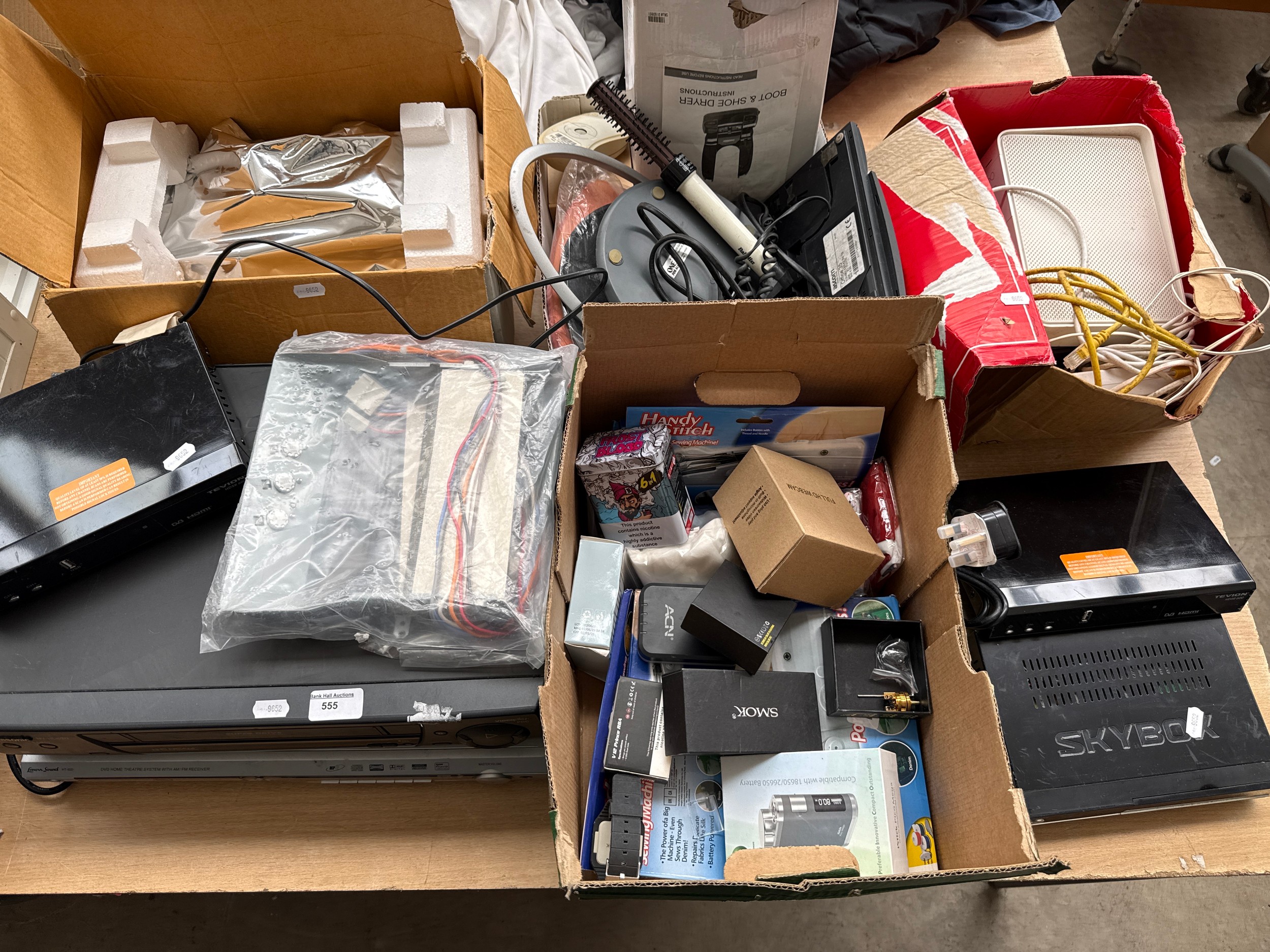 Lot inc VHS and DVD players, Boots and shoe dryer, digital boxes