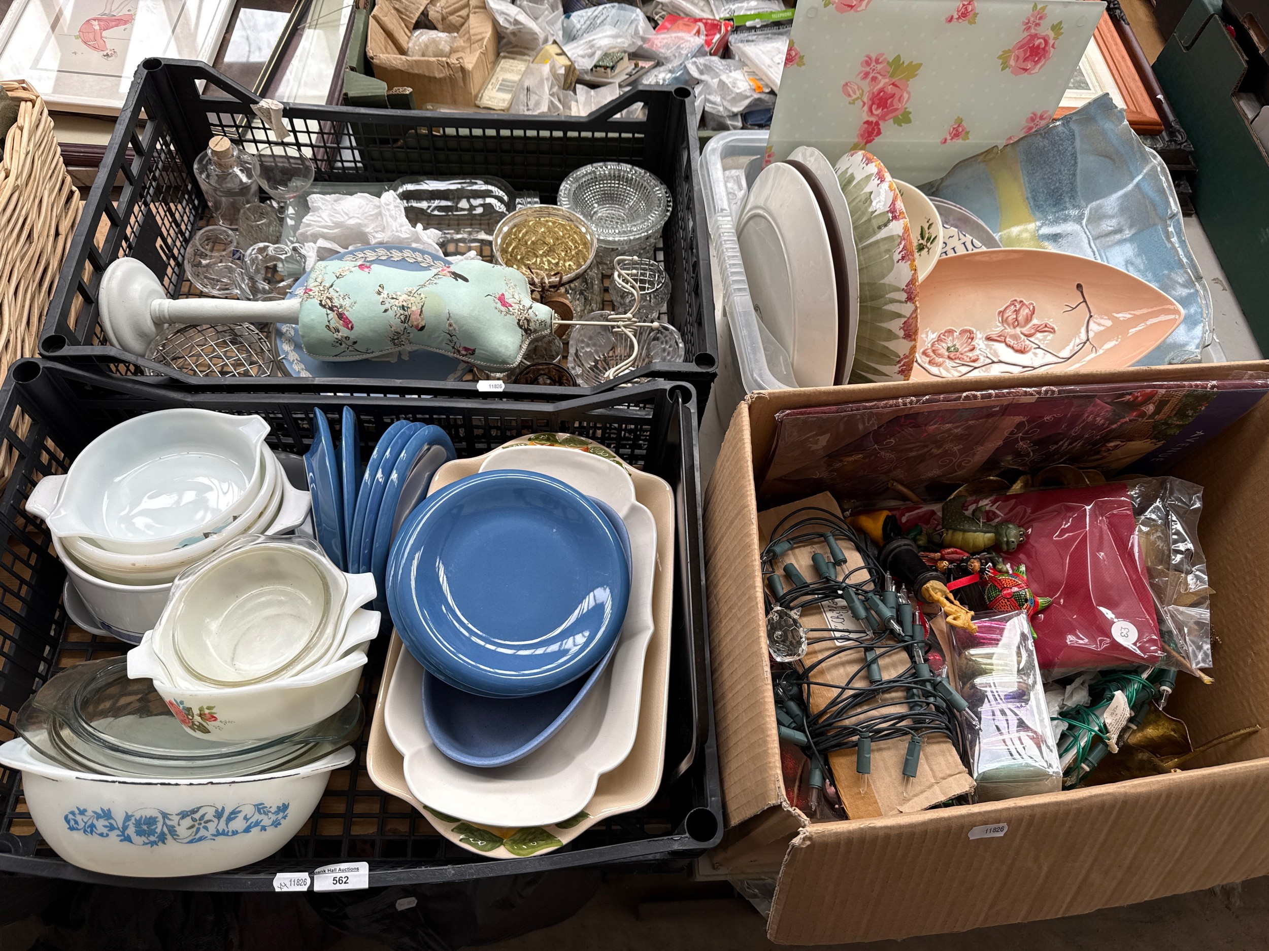 Four boxes of assorted household items