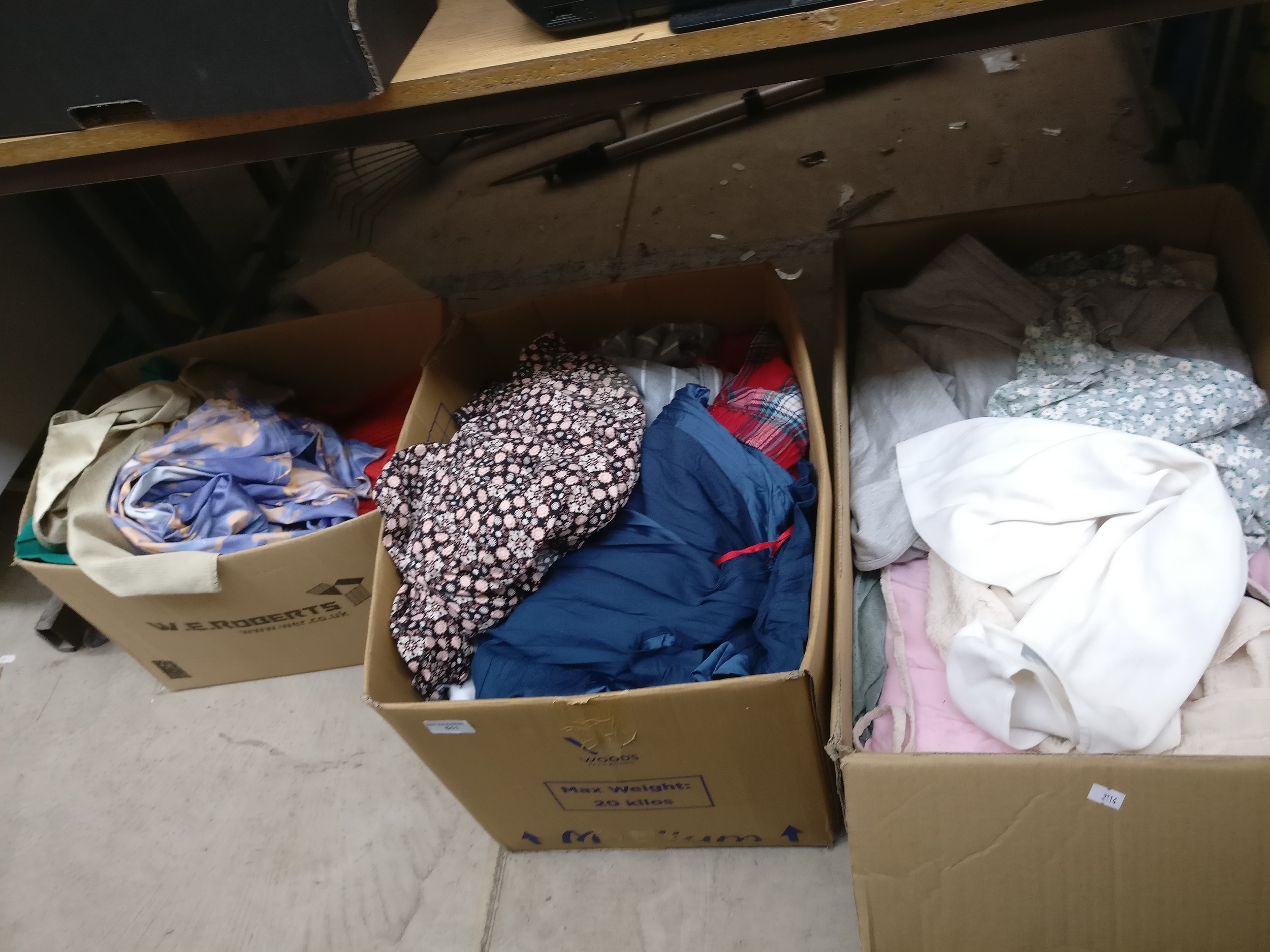 Three boxes of clothing