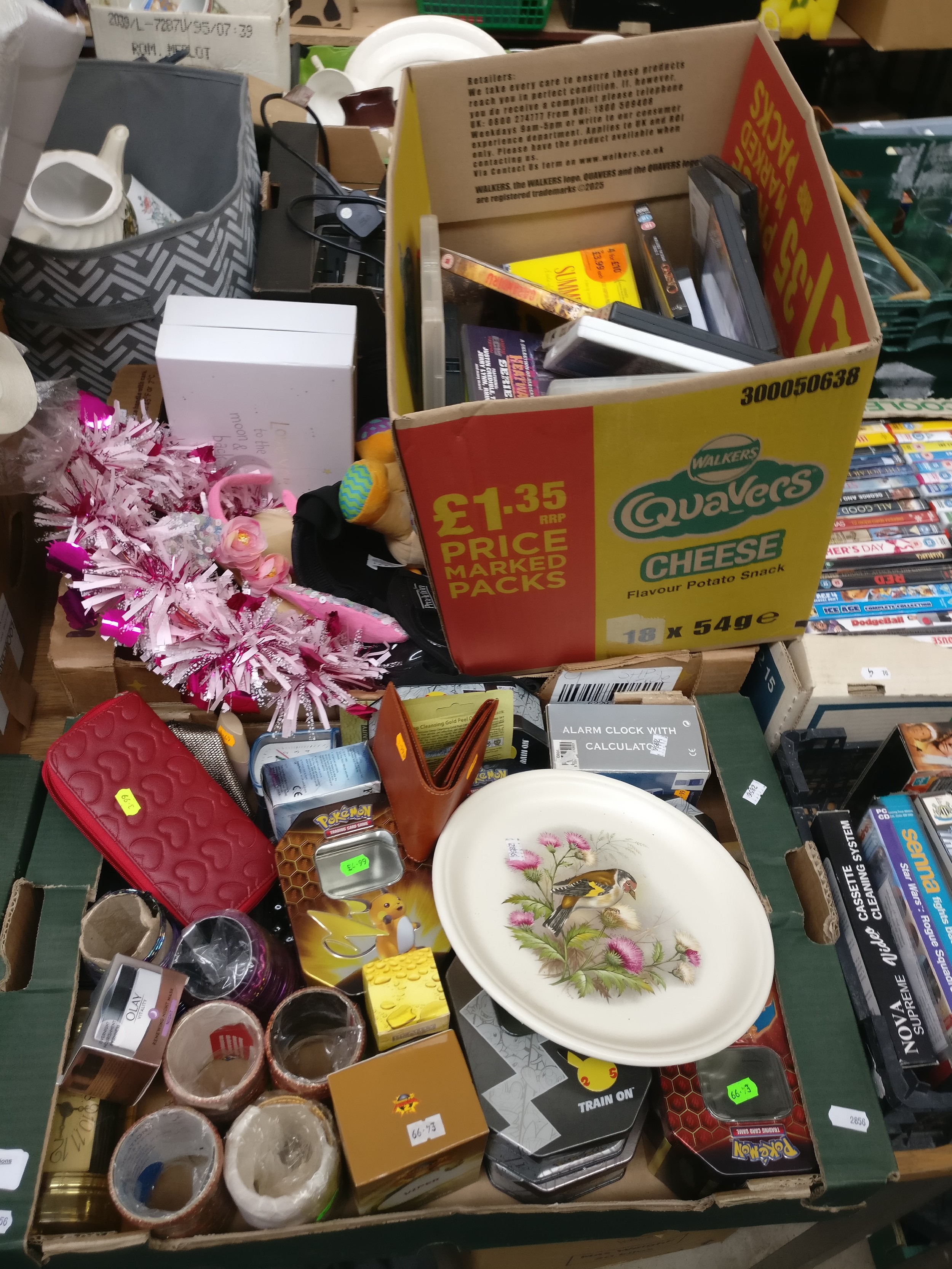 Three boxes inc DVDs, alarm clock, knee pads, bangles, etc