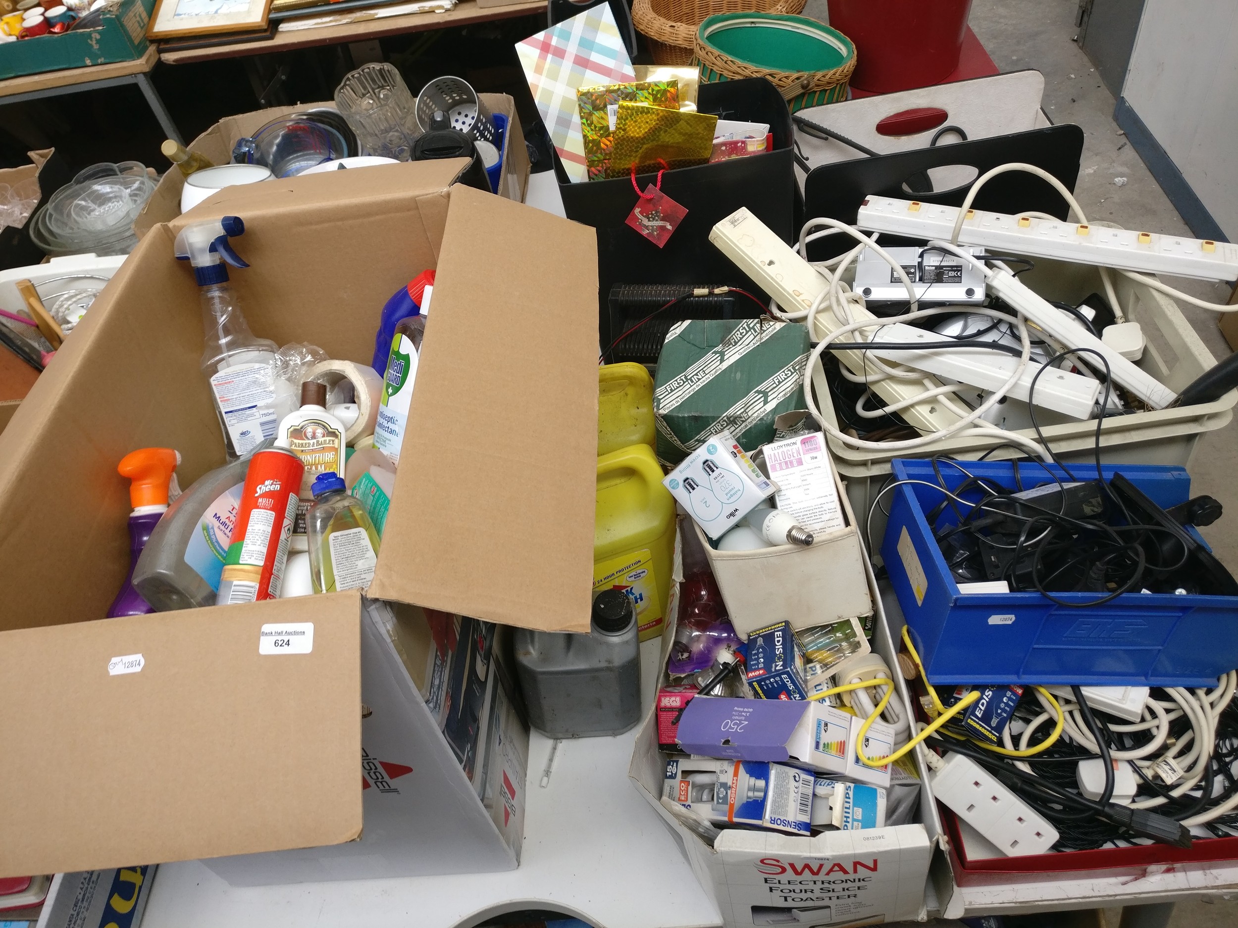 Lot inc household chemicals, extension sockets, lightbulbs, etc