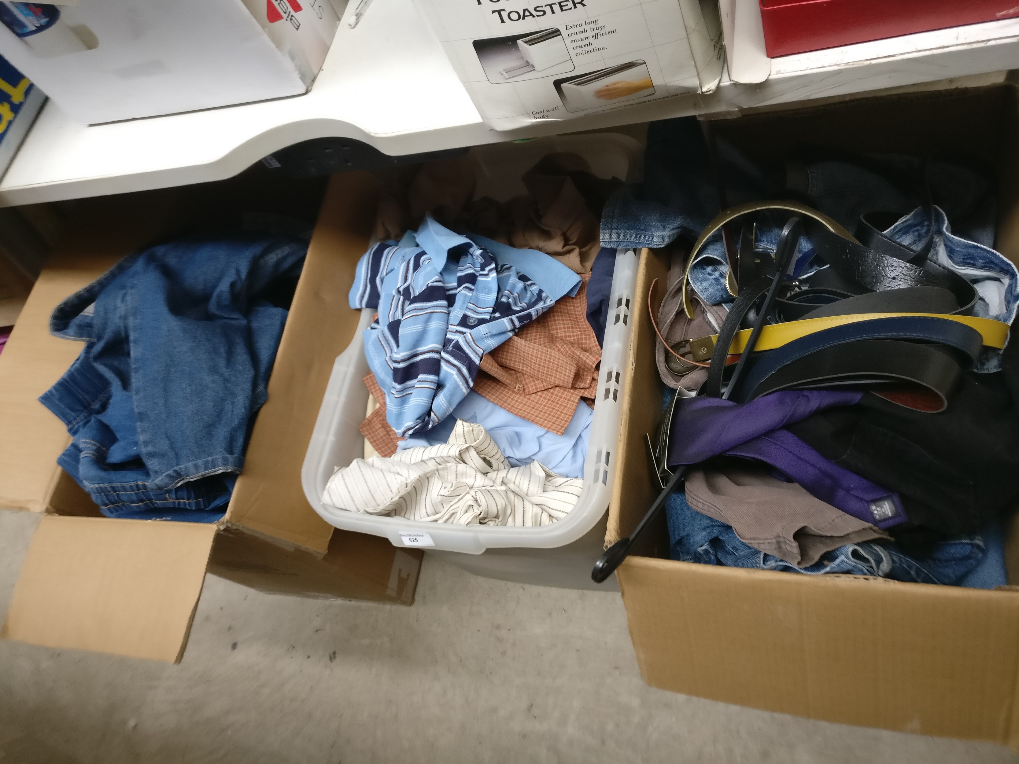 Three boxes of clothing