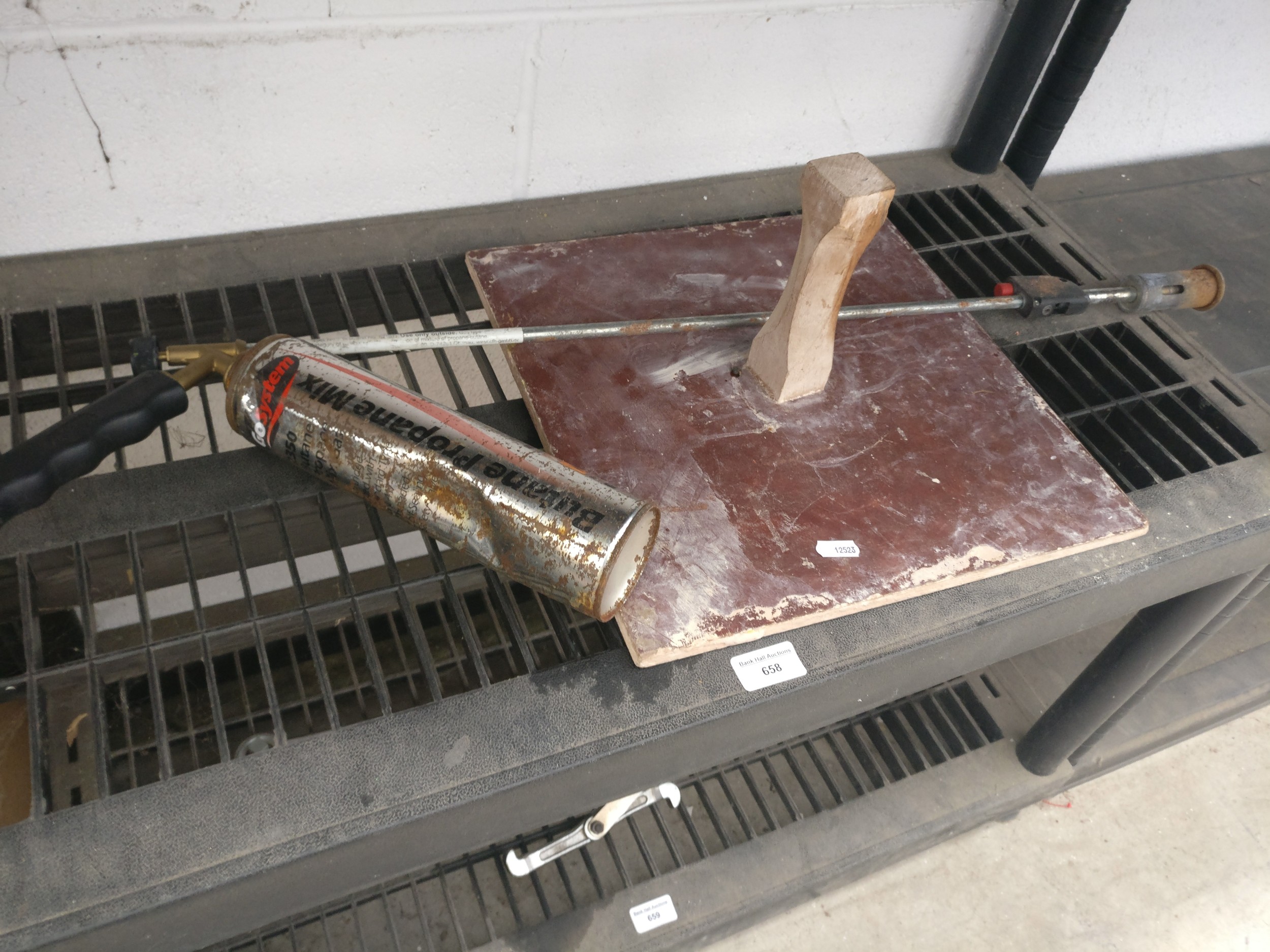 Plasterers pallet and flame gun
