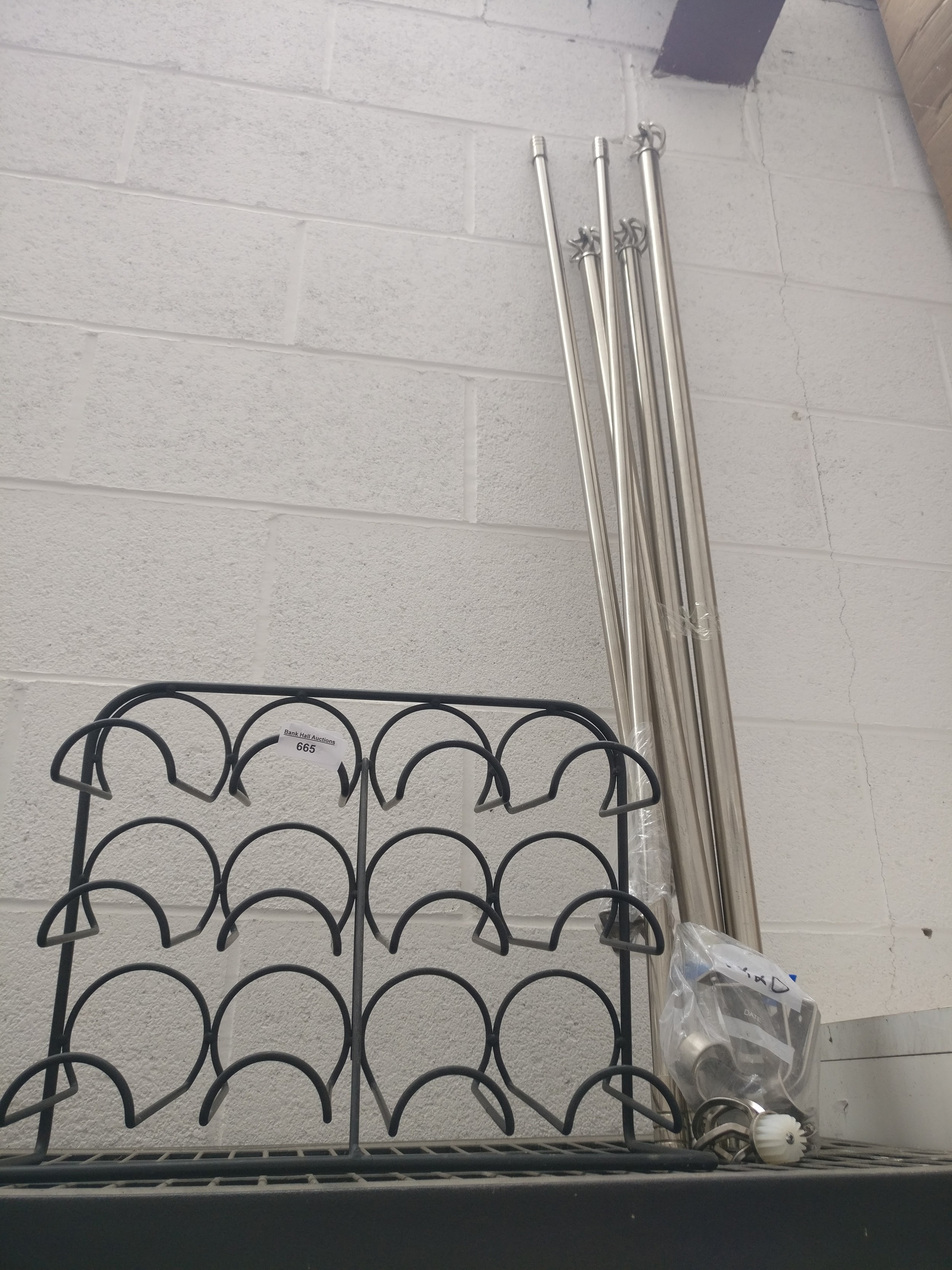 Curtain poles and wine rack