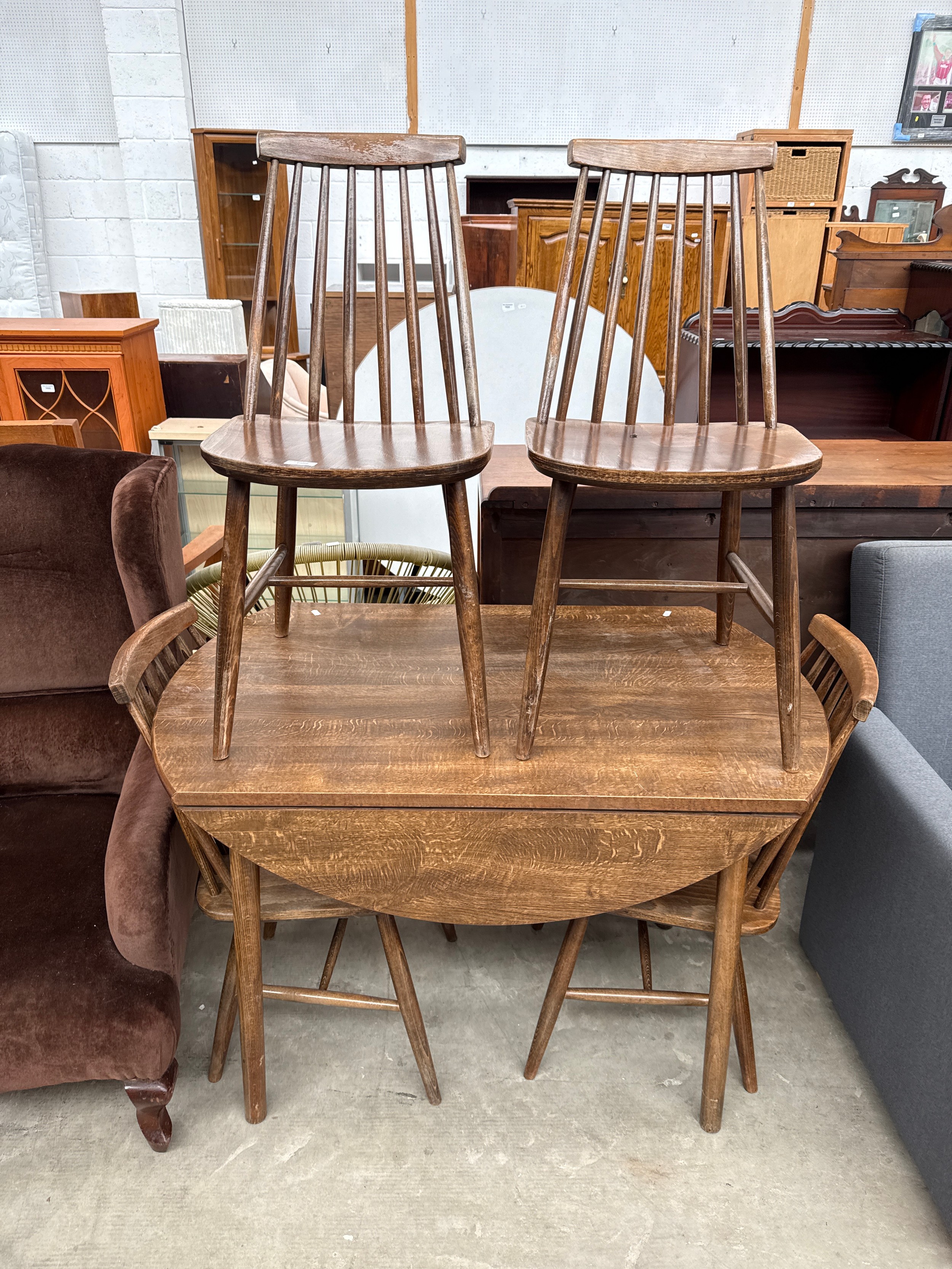 A retro drop leaf dining table and 4 x spindle back chairs